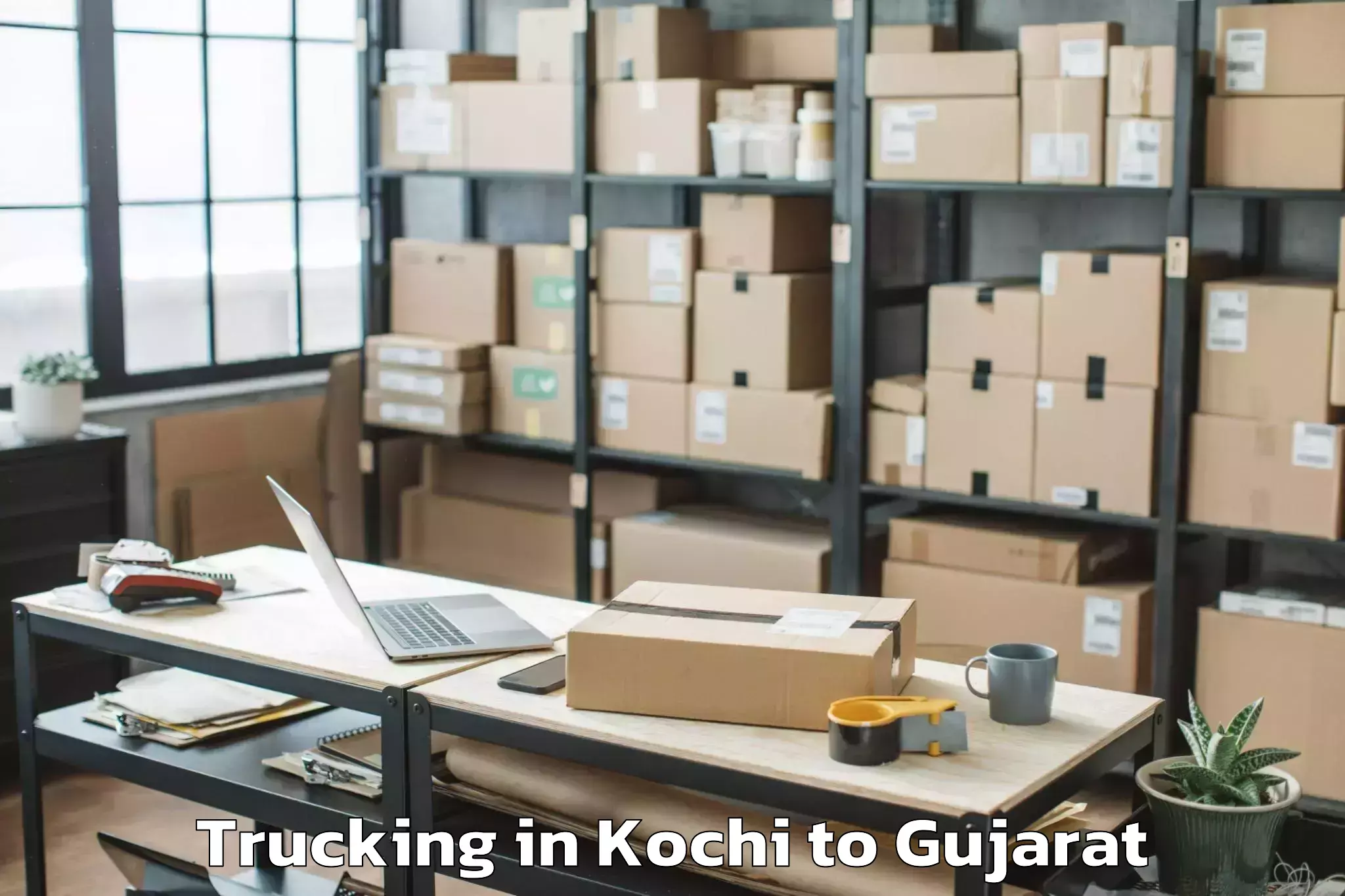 Top Kochi to Dhuwaran Trucking Available